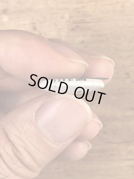 スマイルフェイスのブリキ製のヴィンテージ缶バッチ