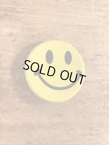 スマイルの顔が描かれたビンテージ缶バッジ