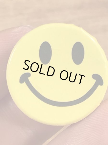 スマイルの顔が描かれたビンテージ缶バッジ