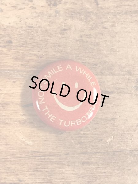 スマイルの顔とメッセージが書かれたビンテージ缶バッジ