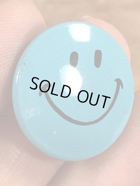 スマイルの顔が描かれたビンテージ缶バッジ