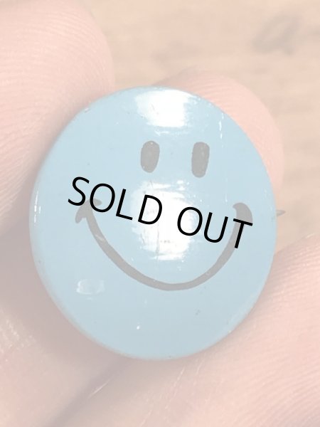 スマイルの顔が描かれたビンテージ缶バッジ