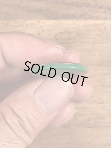 目がクローバーになったスマイルフェイスのヴィンテージ缶バッチ