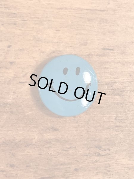 スマイルの顔が描かれたビンテージ缶バッジ