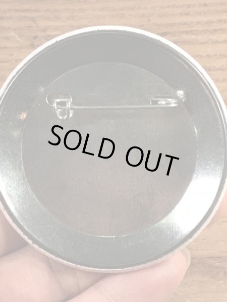 70年代〜頃のハットを被ったスマイルフェイスのヴィンテージ缶バッチ