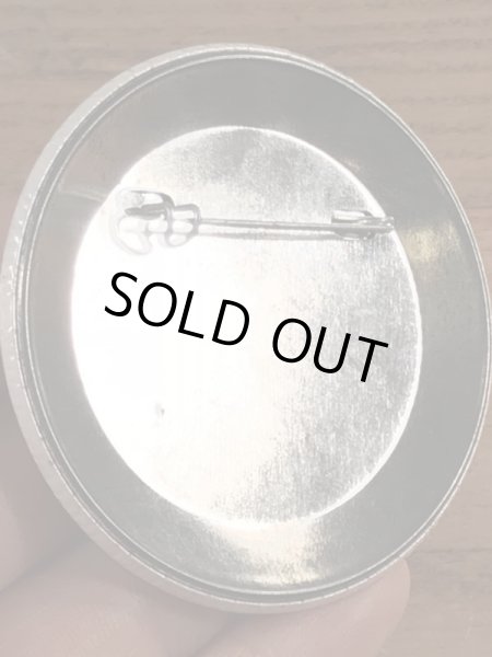 70年代〜頃のハットを被ったスマイルフェイスのヴィンテージ缶バッチ