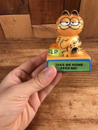 画像1: Garfield “Take Me Home-Feed Me!” Plastic Push Gimmick Toy　ガーフィールド　ビンテージ　ギミックトイ　80年代