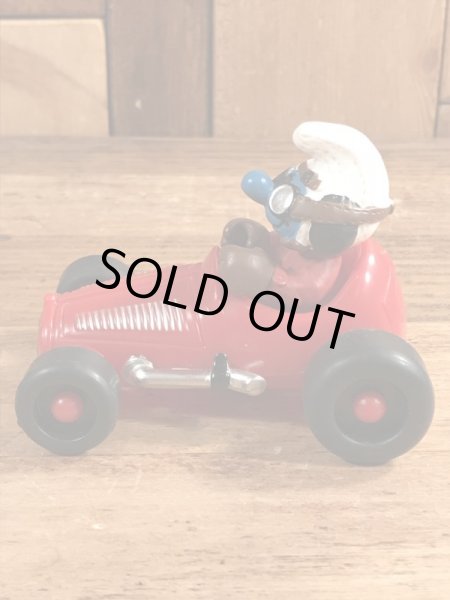 レーシングカーに乗ったスーパースマーフのヴィンテージPVCフィギュア