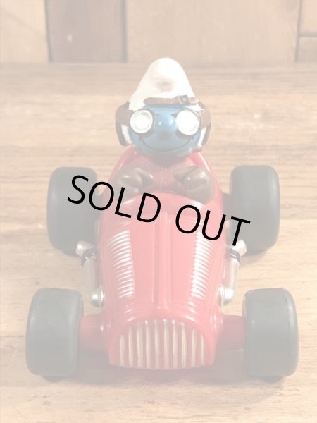 レーシングカーに乗ったスーパースマーフのヴィンテージPVCフィギュア