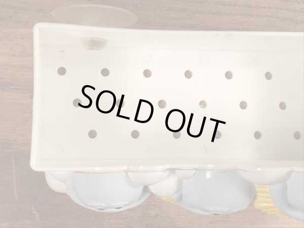 企業キャラクターのスクラビングバブルのヴィンテージバスタブオーガナイザー