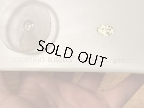 企業キャラクターのスクラビングバブルのヴィンテージバスタブオーガナイザー