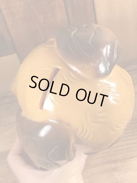 70年代頃のサッドアイの犬のビンテージコインバンク