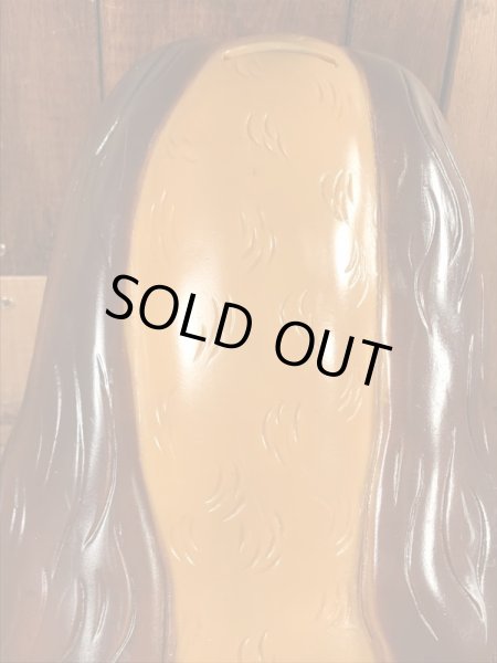 70年代頃のサッドアイの犬のビンテージコインバンク