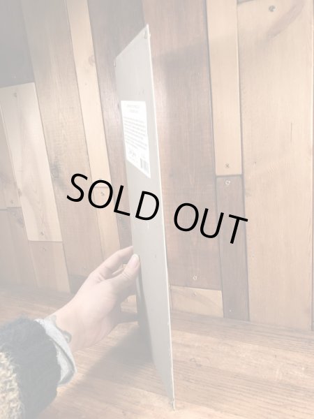 90年代頃の企業キャラクターのミスターピーナッツのビンテージの看板