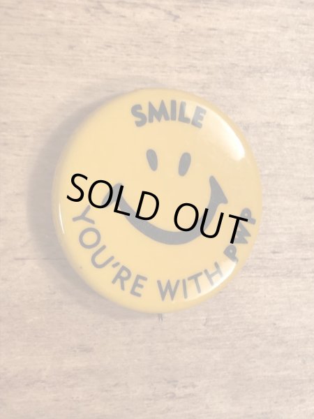 70年代頃の企業物のスマイルのビンテージの缶バッジ