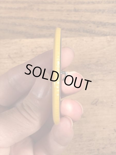 70年代頃の企業物のスマイルフェイスのビンテージの缶バッジ