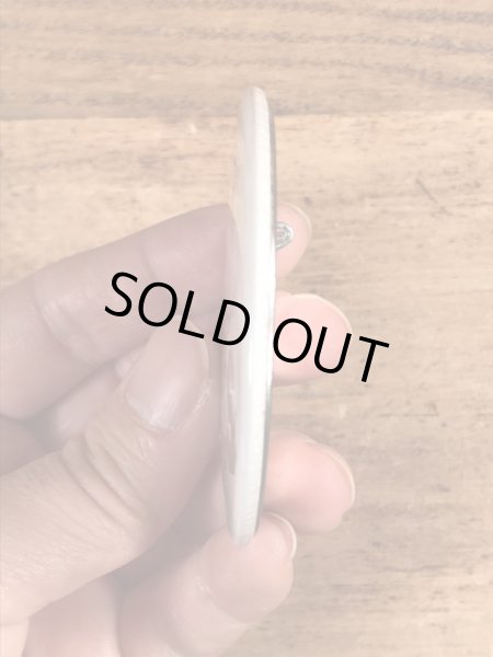 70年代頃の企業物のスマイルのビンテージの缶バッジ