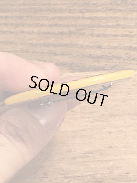 70年代頃の企業物のスマイルフェイスのビンテージの缶バッジ