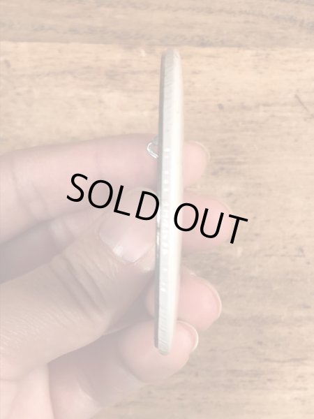 70年代頃の企業物のスマイルのビンテージの缶バッジ