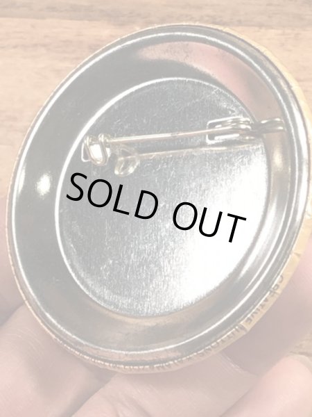 70年代頃の企業物のスマイルフェイスのビンテージの缶バッジ