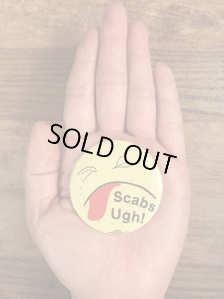 70’sのScabs Ugh!のスマイルフェイスのヴィンテージの缶バッチ