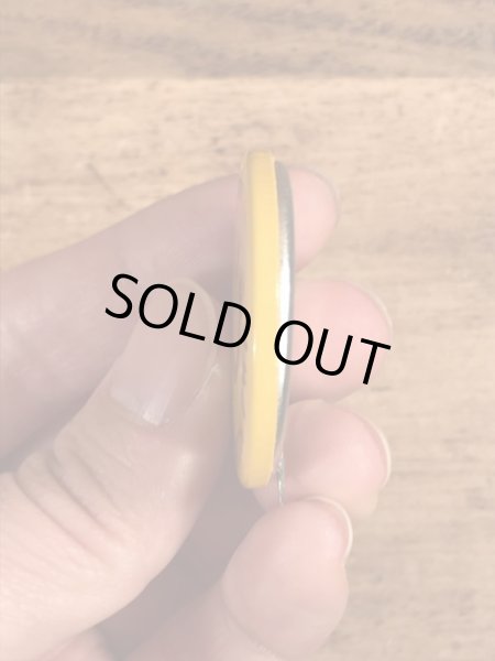 70年代頃の企業物のスマイルのビンテージの缶バッジ