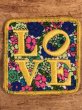 70年代頃の花柄のLoveと書かれたビンテージの刺繡ワッペン