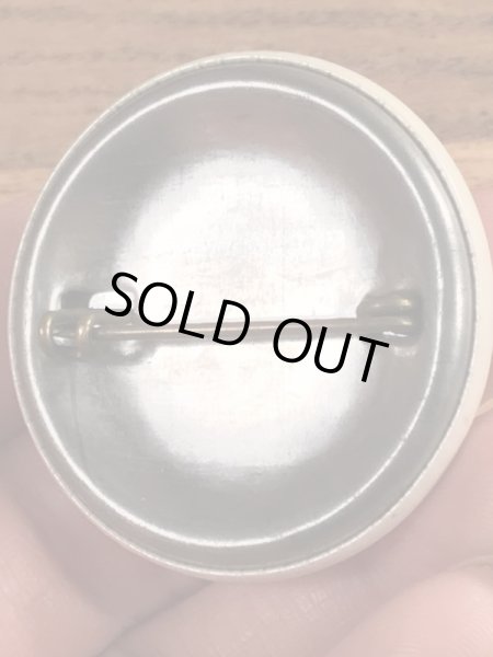 〜40年代頃のMonitorと書かれたビンテージの缶バッジ