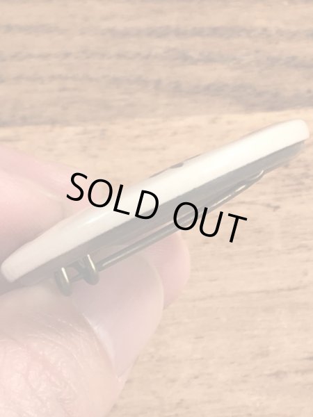 〜40年代頃のMonitorと書かれたビンテージの缶バッジ