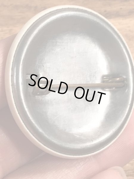 〜40’s頃のMonitorと書かれたヴィンテージの缶バッチ