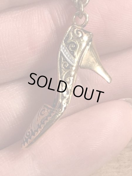 50’s頃のアールデコ調のハイヒールのチャームが付いたヴィンテージの靴ベラ