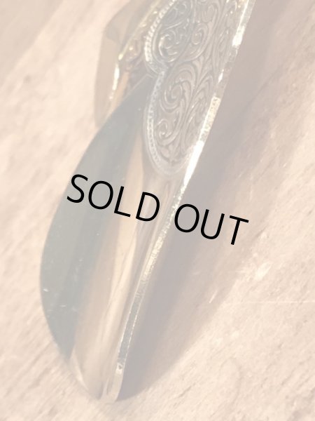 50’s頃のアールデコ調のハイヒールのチャームが付いたヴィンテージの靴ベラ