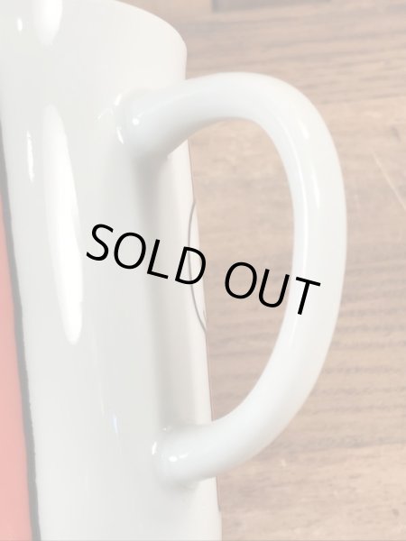 70’sのジョギングをしているスヌーピーのヴィンテージのセラミックマグ