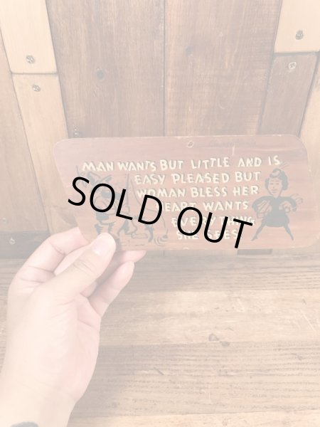 60’sのメッセージが描かれたヴィンテージのサインボード