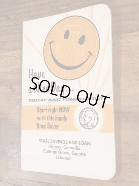 70’sのスマイルフェイスのヴィンテージの貯金ブック