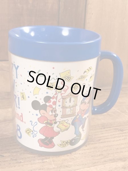 80年代頃のミッキー＆ミニーマウスのビンテージのマグカップ