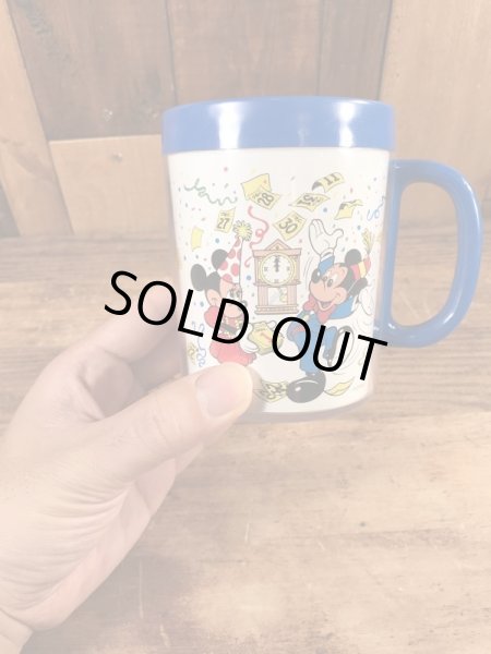 80年代頃のミッキー＆ミニーマウスのビンテージのマグカップ