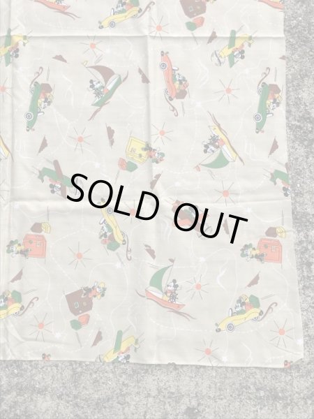 60~70年代頃の乗り物に乗ったミッキーマウスのビンテージの端切れ布