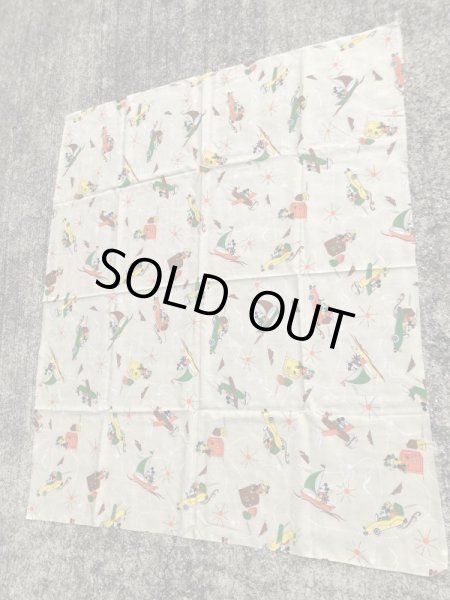 60~70年代頃の乗り物に乗ったミッキーマウスのビンテージの端切れ布