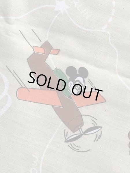 60~70年代頃の乗り物に乗ったミッキーマウスのビンテージの端切れ布