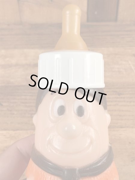 70年代頃のフリントストーンのフレッドのビンテージの哺乳瓶フィギュア