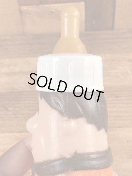 70年代頃のフリントストーンのフレッドのビンテージの哺乳瓶フィギュア