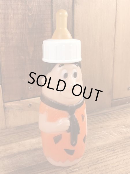 70年代頃のフリントストーンのフレッドのビンテージの哺乳瓶フィギュア