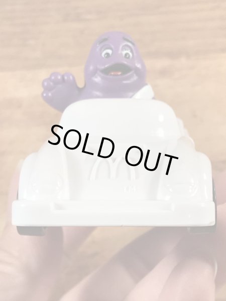 90年代のマクドナルドのグリマスのビンテージのハッピーミールトイ