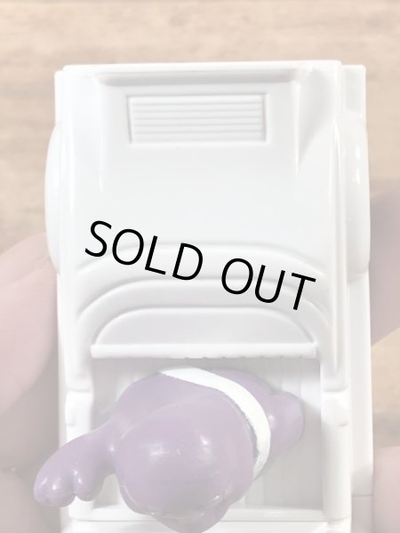 90年代のマクドナルドのグリマスのビンテージのハッピーミールトイ