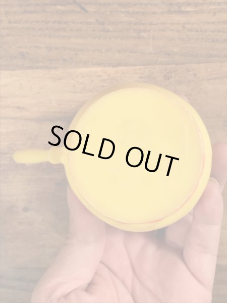 企業キャラクターのファニーフェイスのビンテージのマグカップ