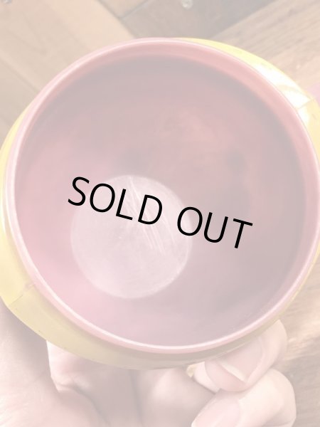 アドバタイジングキャラクターのファニーフェイスのビンテージのマグカップ