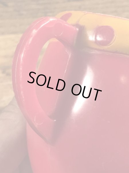 アドバタイジングキャラクターのファニーフェイスのビンテージのマグカップ