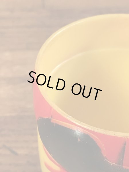 企業キャラクターのファニーフェイスのビンテージのマグカップ