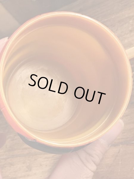 企業キャラクターのファニーフェイスのビンテージのマグカップ